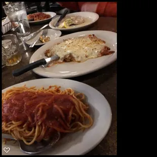 Veal Parmigiana with pasta side.