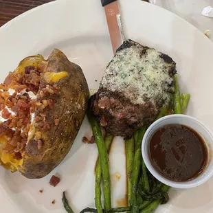 Steak, Asparagus and loaded potato. Steak sauce not needed.