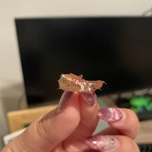 Plastic in chocolate filling.