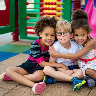 Children playing on the outdoor playground.