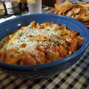 Notice the glass of water compared to the size of this bowl of sausage hot pepper bake.