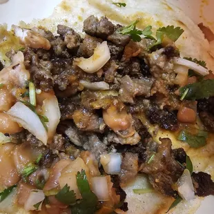 Partially eaten Carne Asada Taco.