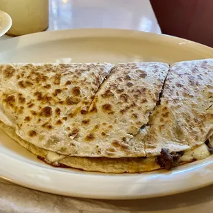 Quesadilla with optional fajita beef. Huge and packed with flavor