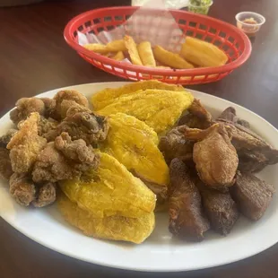 Fried Chicken, Tostones, Fries Pork Bites