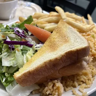 Side to my main dish, fries, salad, rice, and buttered toast