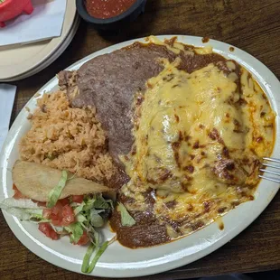 Chicken enchiladas with beef taco