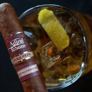 a cigar and a cigar glass