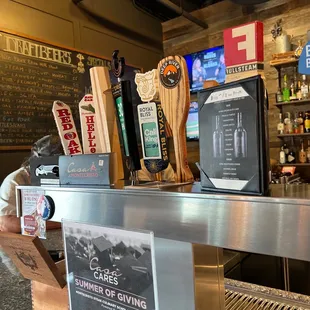 a bar with beer taps