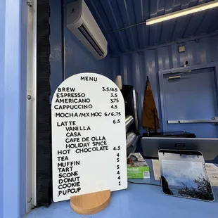 a menu on a food truck