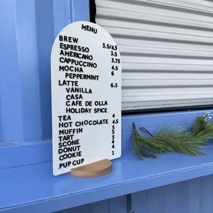 a menu on a window sill