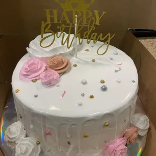 Red velvet cake with drip theme and roses all vegan