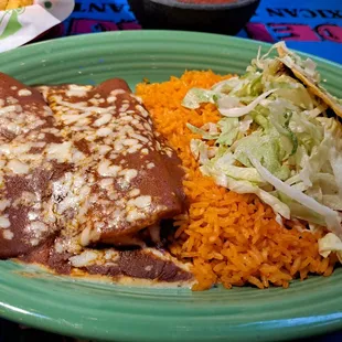 2 cheese enchiladas and Mexican rice and a taco. Made the decision to go al carte