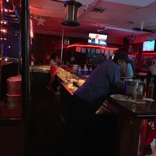 a man sitting at a bar