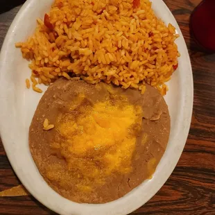 Rice and beans (plate only cones with one, not both)
