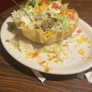 a plate with a salad on it