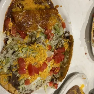 Combo #3 with one enchilada, one machaca taco and one bean tostada.