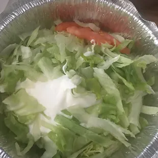 Lettuce, sour cream and tomato