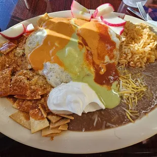 Chilaquiles with over easy eggs, I put 3 types of salsas on top