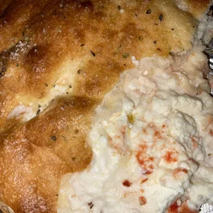 So much ricotta in cheese calzone