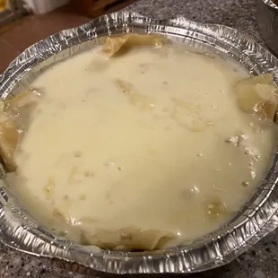 Three cheese enchiladas with cheese sauce. So cheesy!