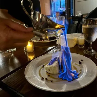 Flaming chocolate sauce being poured over semifreddo!