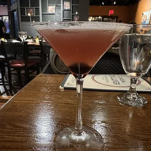 two glasses of wine on a table