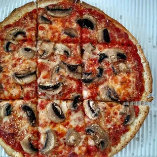 My pizza. I guess cutting pizza like this is the norm for Ohio. Remember that was the way when I lived in Ohio growing up.