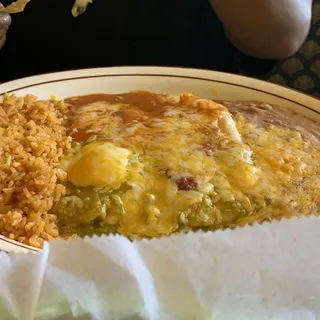 1 Enchilada (Res, Pollo O Queso)