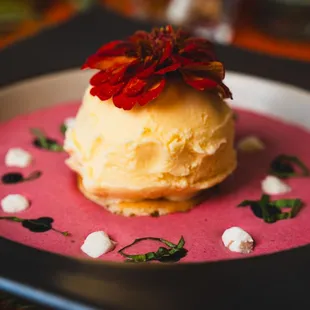 a dish with a flower on top