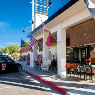 a car parked in front of a restaurant