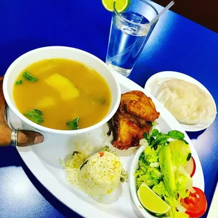 a bowl of soup and a plate of food