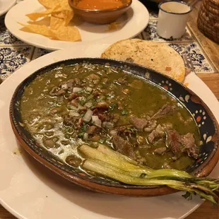 Their signature soup with sautéed green onions, bacon, pork and quesadilla. Sorry I forgot the name but oh so delicious.