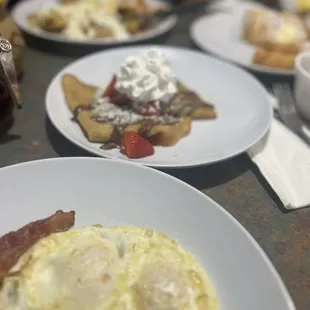 Nutella strawberry crepe and over easy egg