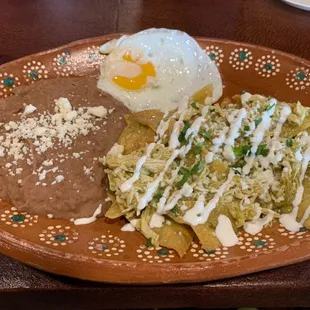 Chilaquiles Verdes with chicken and an egg