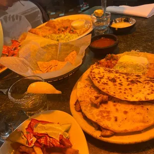 plates of food and drinks on a table