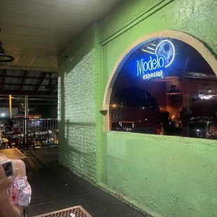 a woman taking a picture of her food