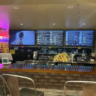 The draft list, one of the movie screens, and small view of the entrance to the upstairs movie area.