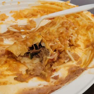 Nasty enchilada with no cheese and sauce.