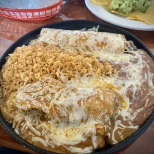 Ground beef enchilada and pork tamale