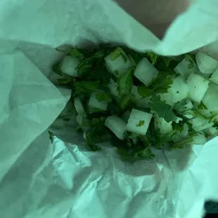 They gave my friend onion and cilantro in a paper bag. This place has no standard this is just gross