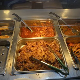 Carnitas at the bottom and not sure what the one above is called a the sign was missing but it was pretty good