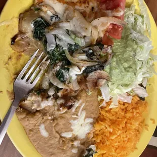 #51 Grilled chicken breast with onions spinach and cheese.