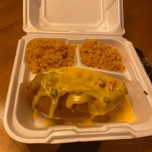 a meal in a styrofoam container
