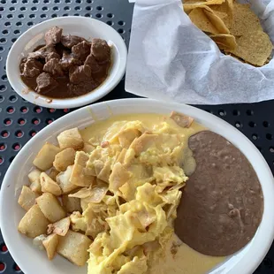 Migas with Carne Guisada on the side