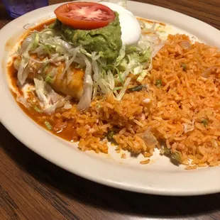 Chicken chimichanga with rice.
