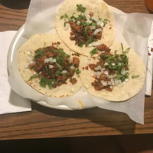 three tortillas on a plate