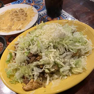 Fajita potato with steak and grilled chicken