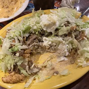 Fajita potato with steak and grilled chicken