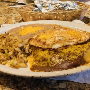 Cheese Enchilada with fried egg beans &amp; rice