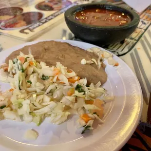 Complimentary salsa, chips, refried beans, and slaw?  #UpCloseSavor XP